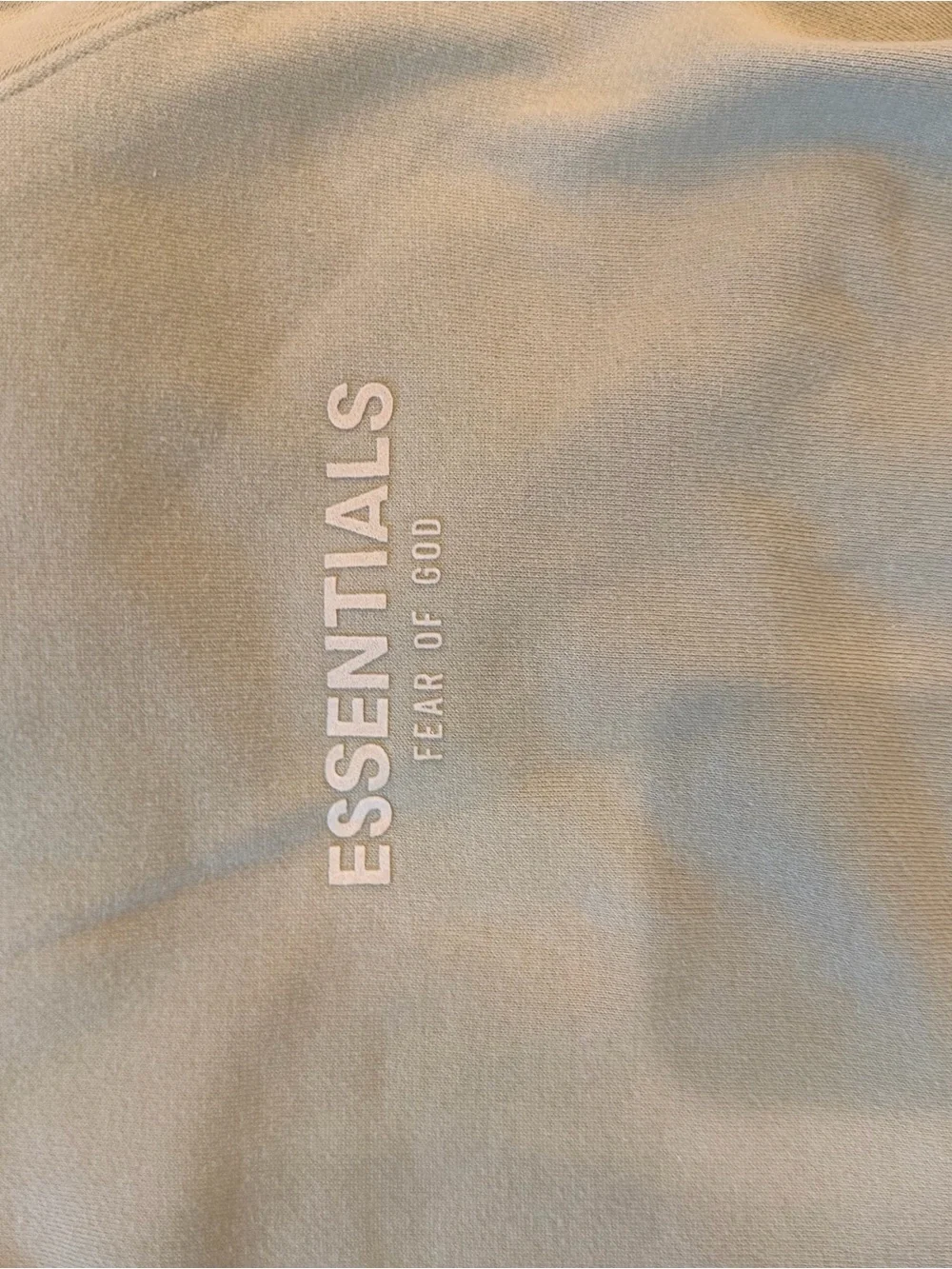 Large Fear of God ESSENTIALS Hoodie in Light Green